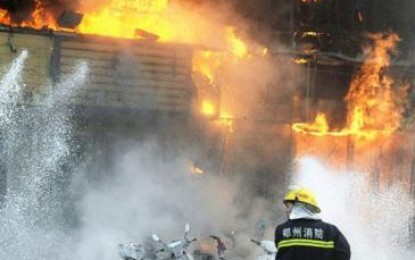 61 قتيلاً بحريق مسلخ دواجن في الصين