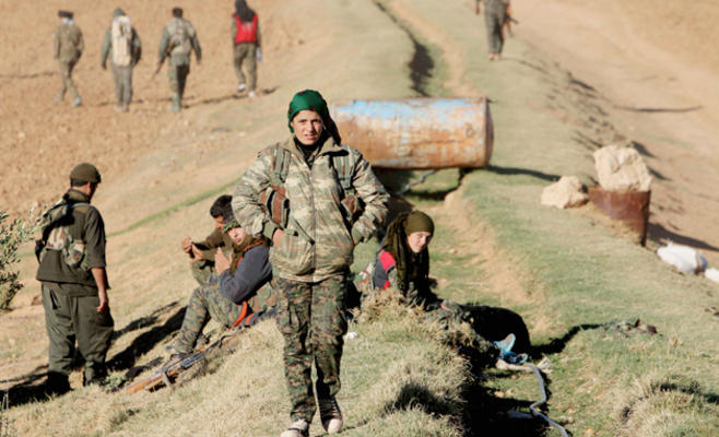 الاكراد يطرودن داعش من كوباني